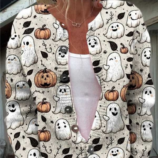 Person wearing a Halloween-themed shirt with ghosts and pumpkins.