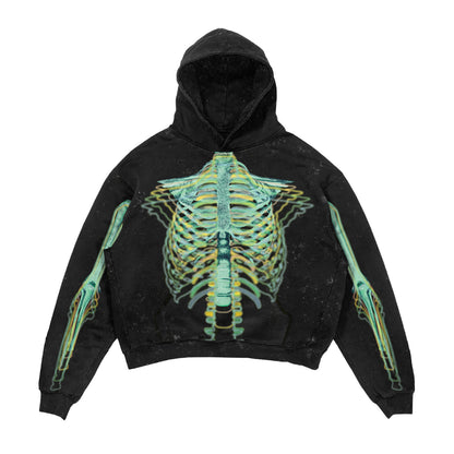 Black hoodie with green skeleton design on a white background