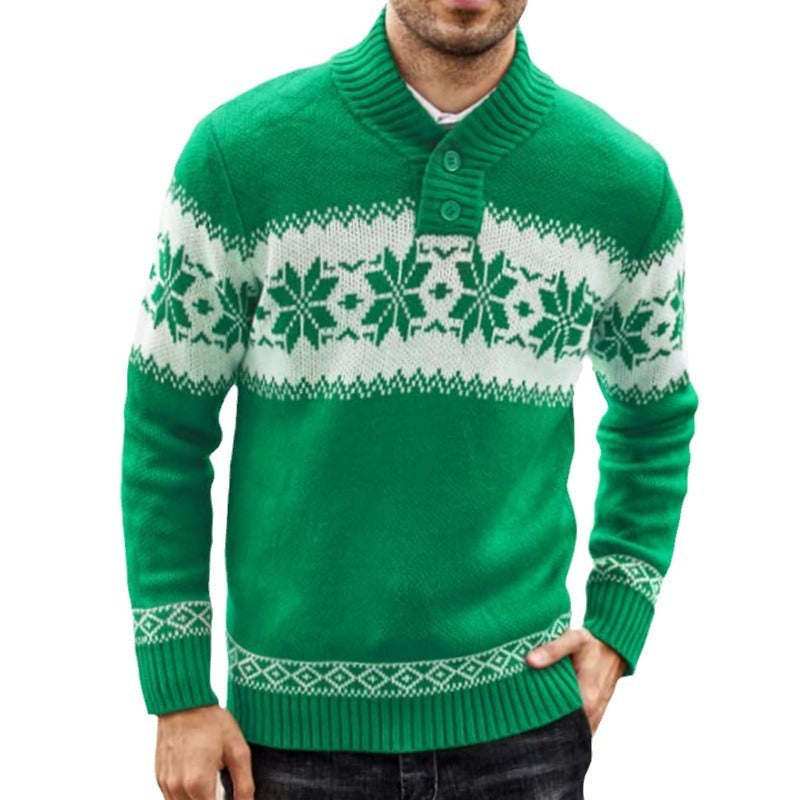Green sweater with white snowflake pattern worn by a person on a white background
