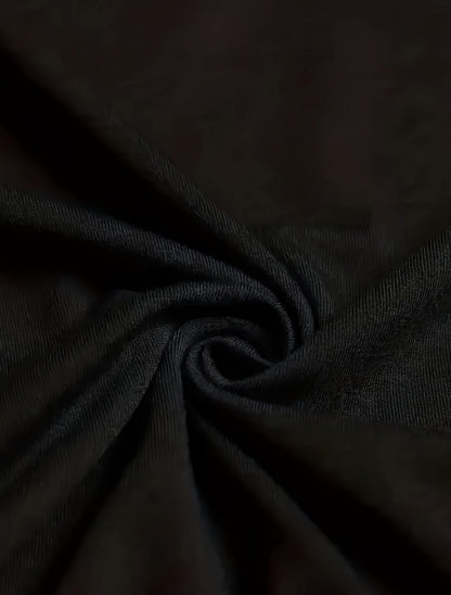 Close-up of dark fabric with folds