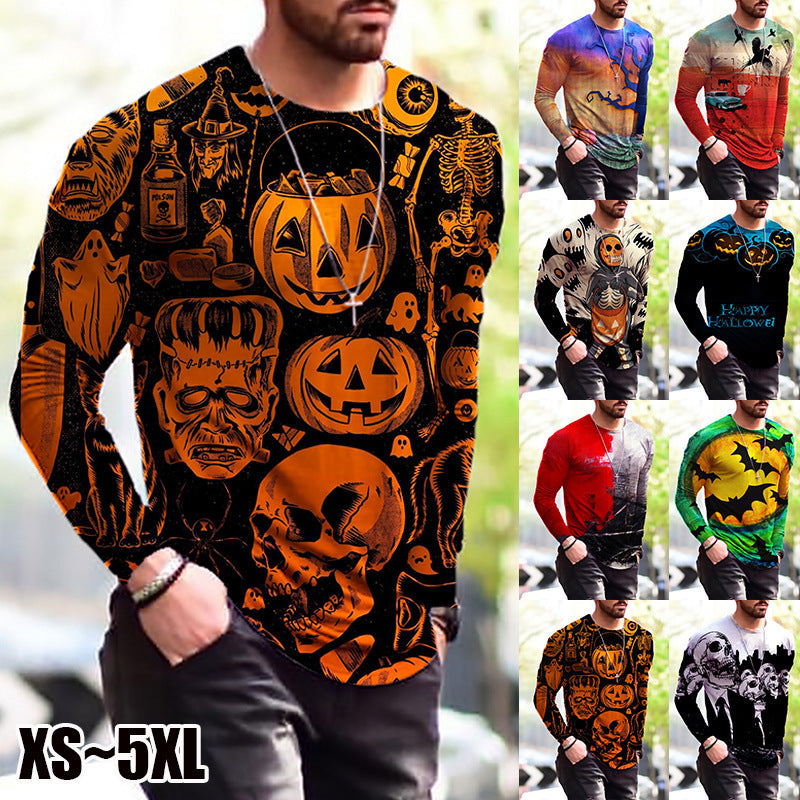 Halloween-themed long-sleeve shirt with pumpkins, ghosts, and skulls, displayed with other colorful shirts.