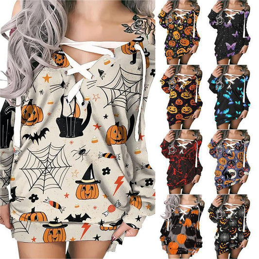 Halloween-themed dresses with pumpkins, ghosts, and spiders on a white background.
