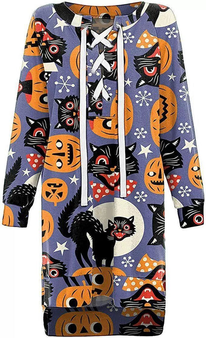 Halloween-themed outfit with cats and pumpkins on a blue background