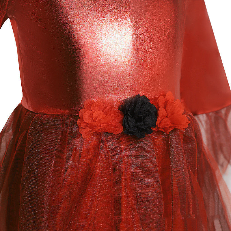 Red dress with floral details on a white background